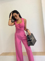 Dopasowane różowe body z różą Lamilla.