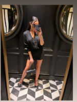 Rozpinany sweterek i krótkie spodenki LaMilla.