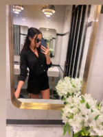 Czarny komplet składający się ze spodenek i sweterka LaMilla.