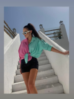 Dwukolorowa koszula typu nietoperz z marki LaMilla.