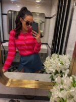 Sweterek w czerwono różowe paski marki LaMilla.