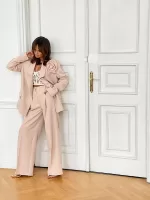 Szerokie spodnie w beżowym kolorze z wysokim stanem LaMilla.