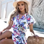 Lniana mini sukienka w niebieskie kwiaty Xana.