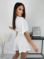 Kombinezon z krótkim rękawkiem zapinany na guziki Lola.