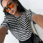 bluzka z poduszkami na ramionach w czarno - białe paski Lamilla