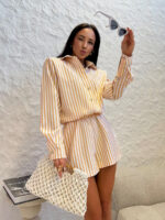 Kombinezon LaMilla w pomarańczowe paski