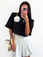 Czarna bluzka LaMilla z białym kwiatem