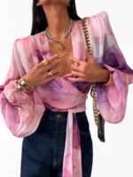 Wiązana bluzka LaMilla w fioletowo różowe kwiaty