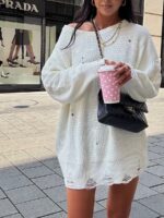 Biały sweter LaMilla z dziurami