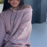 Różowy sweter lamilla z dziurami