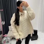 Ecru sweter z frędzlami LaMilla