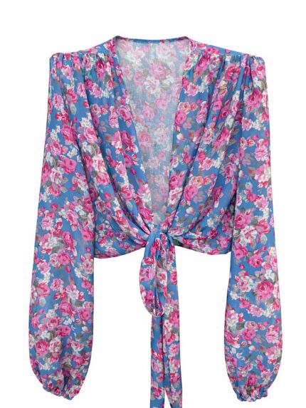 Wiązana bluzka LaMilla w różowe kwiaty na niebieskim tle