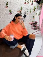 Pomarańczowa bluza z kapturem LaMilla kangurek