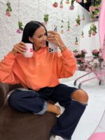 Pomarańczowa bluza z kapturem LaMilla kangurek