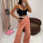 Dresowe szerokie spodnie LaMilla brzoskwiniowe