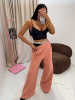 Dresowe szerokie spodnie LaMilla brzoskwiniowe