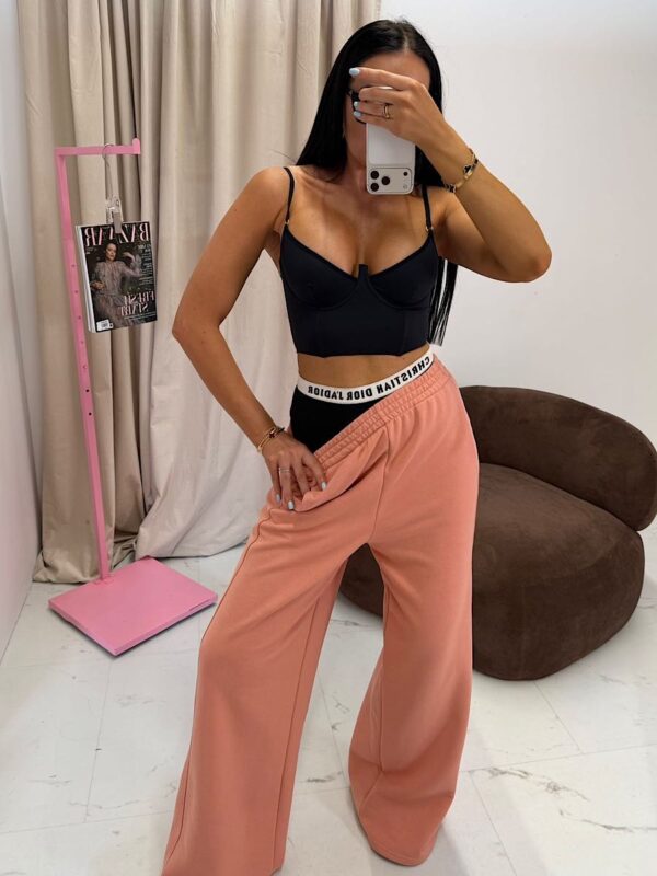 Dresowe szerokie spodnie LaMilla brzoskwiniowe